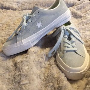 Baby blue suede one star Converse.